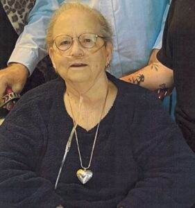 Comforting elderly woman receiving compassionate pet cremation care at Dogwood Cremations LLC.
