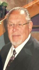 Gentleman in formal attire, representing compassion and care for pet cremation services.
