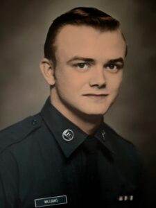 Military uniform portrait of a young man, representing dignity and respect in funeral services.